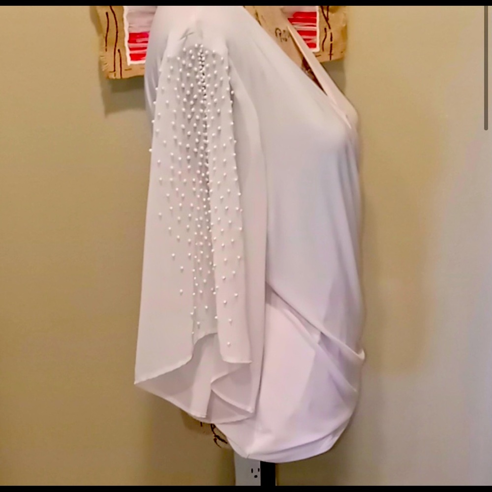 Light pink silk wrap blouse with pearl sob